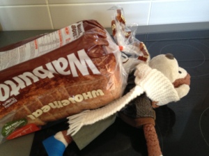 Monkey hadn't thought that one through though as...whoop..the bread came crashing down on top, squashing him flat.