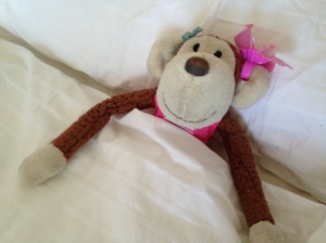 Hugless led monkey to a big fluffy bed where someone was just waking up....