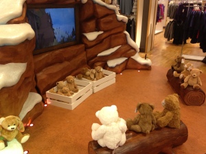 The bears sat unsuspecting on the log seats. Well the monkeys hadnt arrived for the show yet